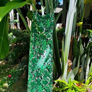 midi green patterned dress with cinched back and tie straps